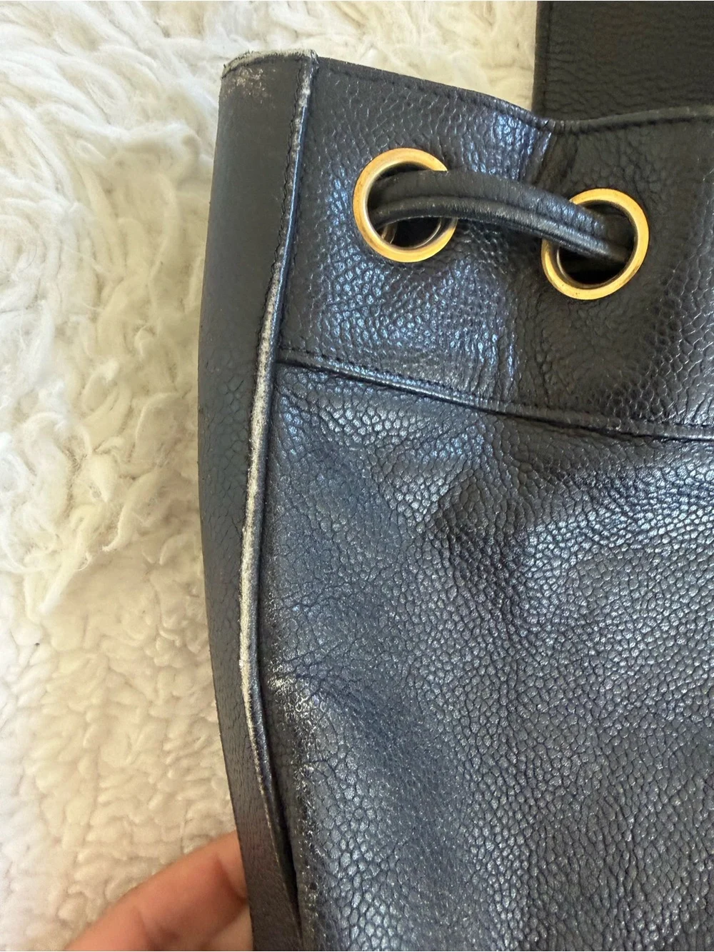CHANEL Black Caviar Leather Drawstring Backpack with Gold-Tone Eyelets
